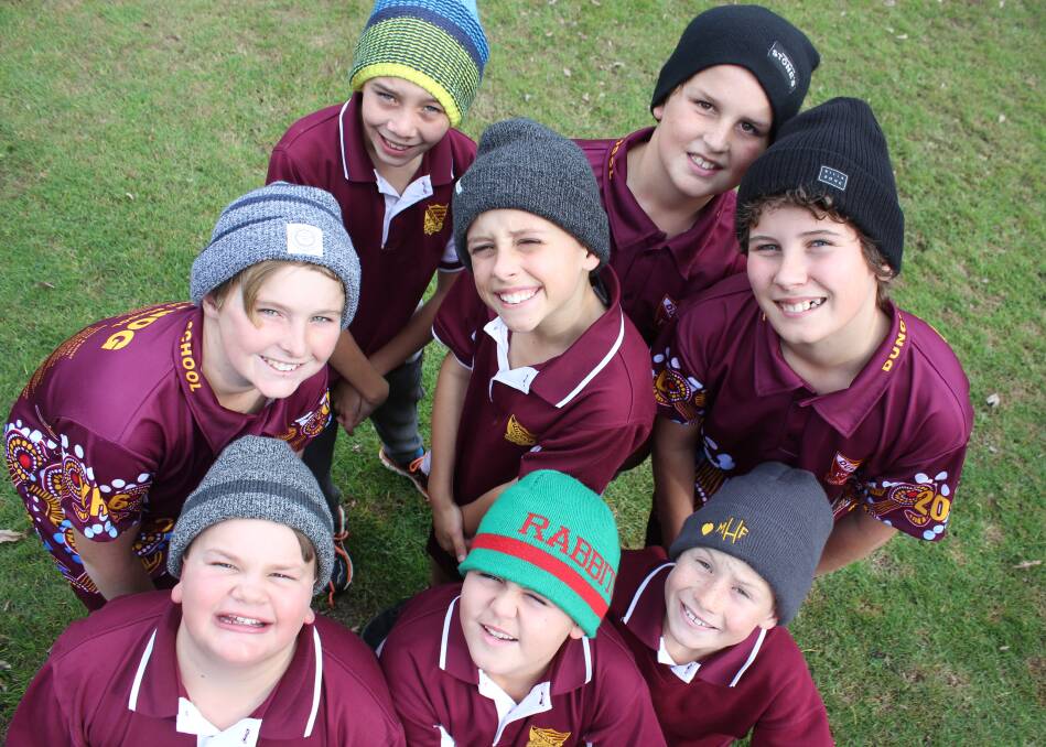 SMILES: Some of the Dungog Public School students supporting the Beanie For Brain Cancer day which raised well over $300 for the Mark Hughes Foundation.