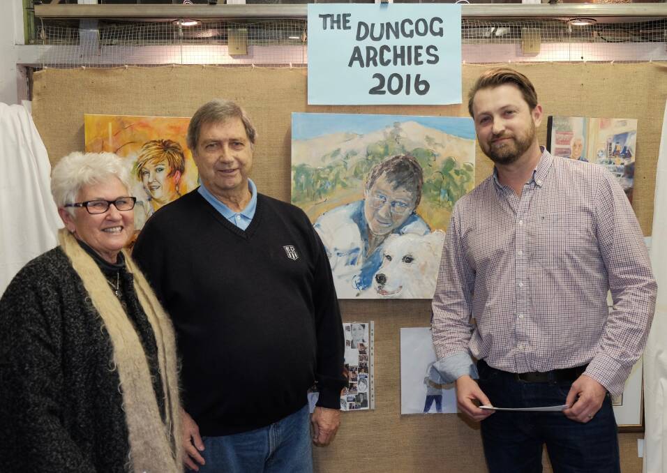 2016 Archies:: Artist Gaye Shield, her husband Bob and Mini Archies judge Dr Brendon Chasten with Gaye's winning portrait of Bob and Mags. Picture: CHRIS PRIDAY