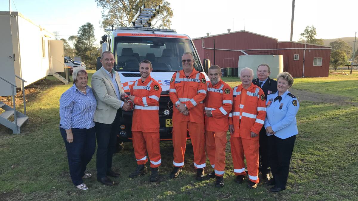 PRESENTATION: Michael Johnsen MP with members of the Stroud SES Unit, and MidCoast Councillor Karen Hutchinson. 