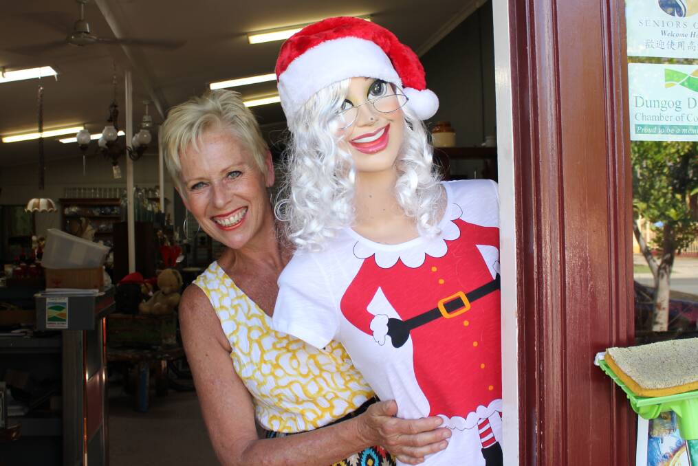 FESTIVE: Jenny Lewis, from the Dungog District Chamber of Commerce, is encouraging people to shop local first and to vote for the best dressed Christmas display.