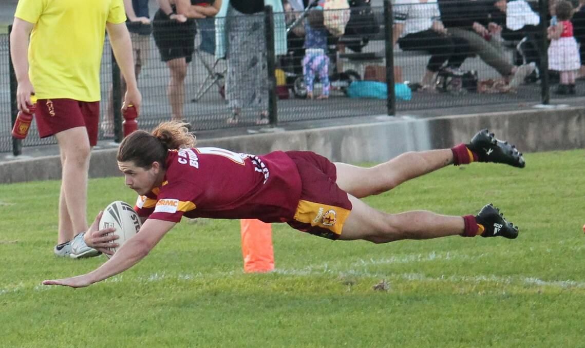 HAT-TRICK: Dungog's Trai Brekelmans backed up his double on debut with a hat-trick of tries against Abermain on Friday night. Picture: Jeanie Briggs