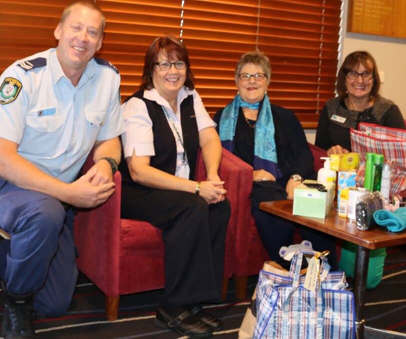 HELPERS: Snr Const David Hanna, Dungog Hospital's Jane Levick, Dungog Rotary Club secretary Bev Irwin and Community Support Worker Nina Williams. Picture: Toby Solomon.