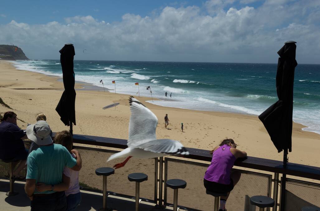HOT: Warm sunny conditions had people out enjoying the beach at Merewether. Picture: Max Mason-Hubers