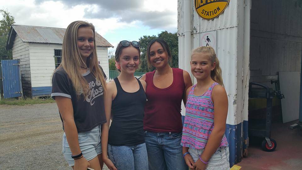 SNAP: Abbey Daughtrey, 14, Emma Haskins, 12, Jessica Mauboy and Jade Daughtrey, 11, are all smiles in Dungog.