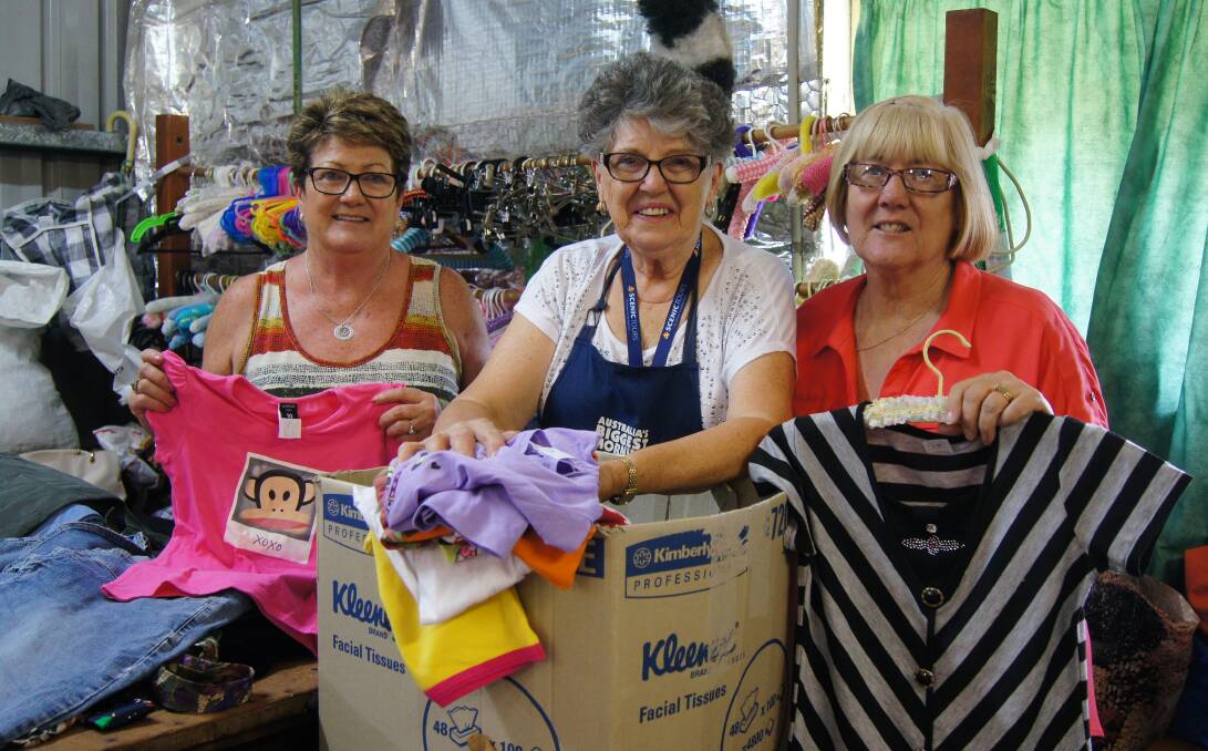 VOLUNTEERS: Gillian Finch, centre, pictured with Maree Martin and Lyndell Davey. Gillian started the Op Shop in 1999 to help the community.