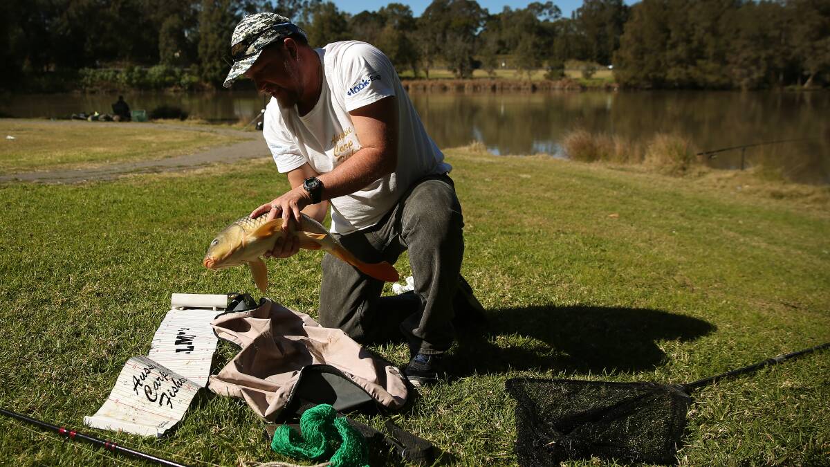 Mick with his first catch of the day at Maitland's Telarah Lagoon. 
