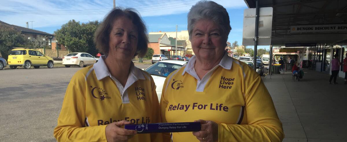 WINNERS: Lyn Moseley (left) with Margaret Jones, holding the baton which they recieved on behalf of Dungog Shire for its participation in the Relay for Life. Picture: Melinda McMillan 
