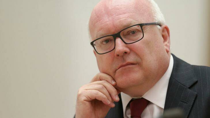 Attorney-General George Brandis maintains the new restrictions are legal.
 Photo: Alex Ellinghausen