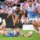 Sam Walker scores a try for the Roosters, who hammered St George Illawarra in the Anzac Day clash. (Dan Himbrechts/AAP PHOTOS)