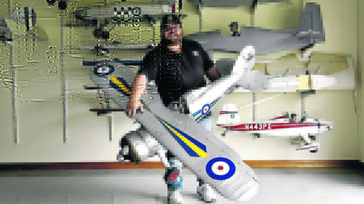 AIR SHOW: Craige Bryson with some of the scale model aircraft that will be seen flying at Luskintyre airfield this weekend.
