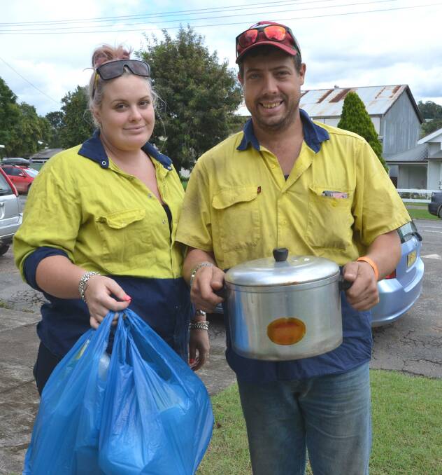 Beresfield volunteers Rebecca Gilbert and Mick Perryman delivering food items to the shelter. Pic: Janelle O'Neill