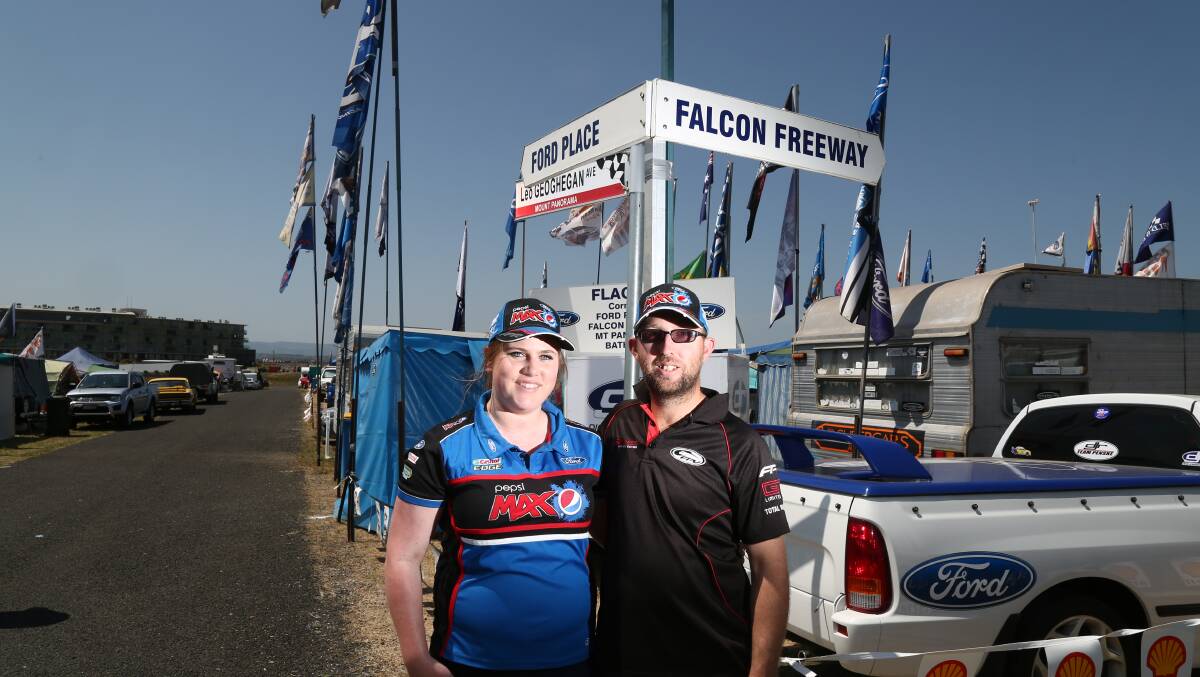 RACE FANS: Nadine Roach and Richard Gear from Oberon were among the race fans soaking up the atmosphere on Mount Panorama yesterday. Photos: PHIL BLATCH	 100915pbcampers6