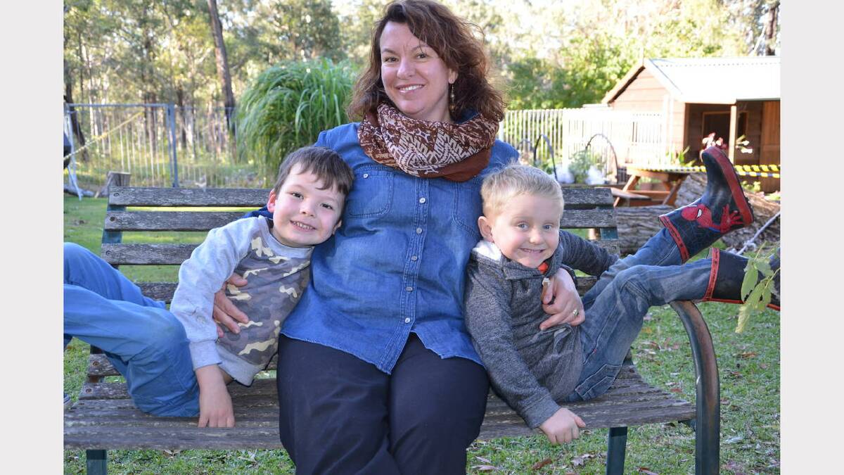 Clarence Town preschool director Rebecca Boland with preschoolers William Merrick and Kynen McNaught