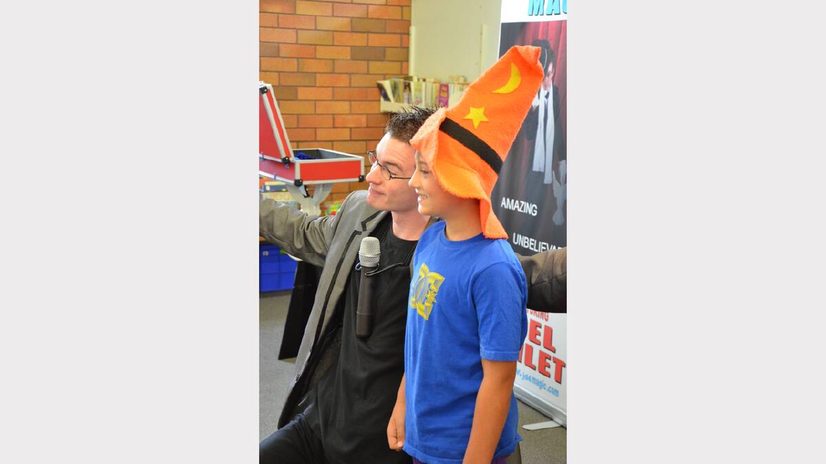 Magician Joel Howlett performing with Robbie at Dungog Library on Wednesday