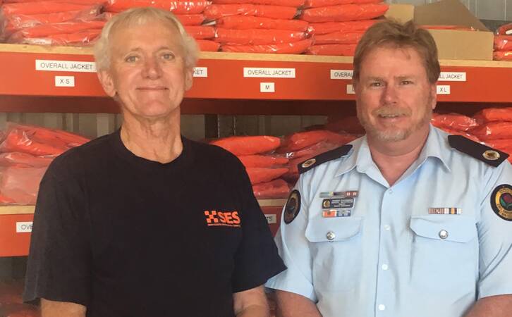 Dungog SES unit member Ronnie Studdart  with SES Assistant Commissioner Mark Morrow 