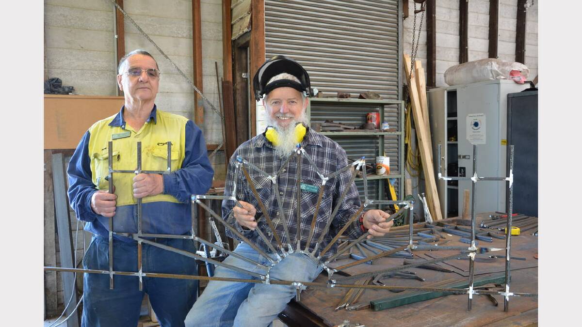 Dungog Menshed members Ron Jones and Jeff Trustum with the new fence they are constructing