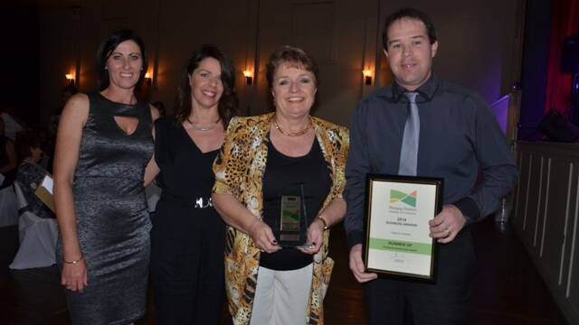 Sponsors of the Professional Services Award Katrina Brown and Lisa Lambert-Smith from Shine Hair and Beauty with Sandy White representing the winner Dungog Veterinary Hospital and runner-up Stuart Berry from Addison Partners.
