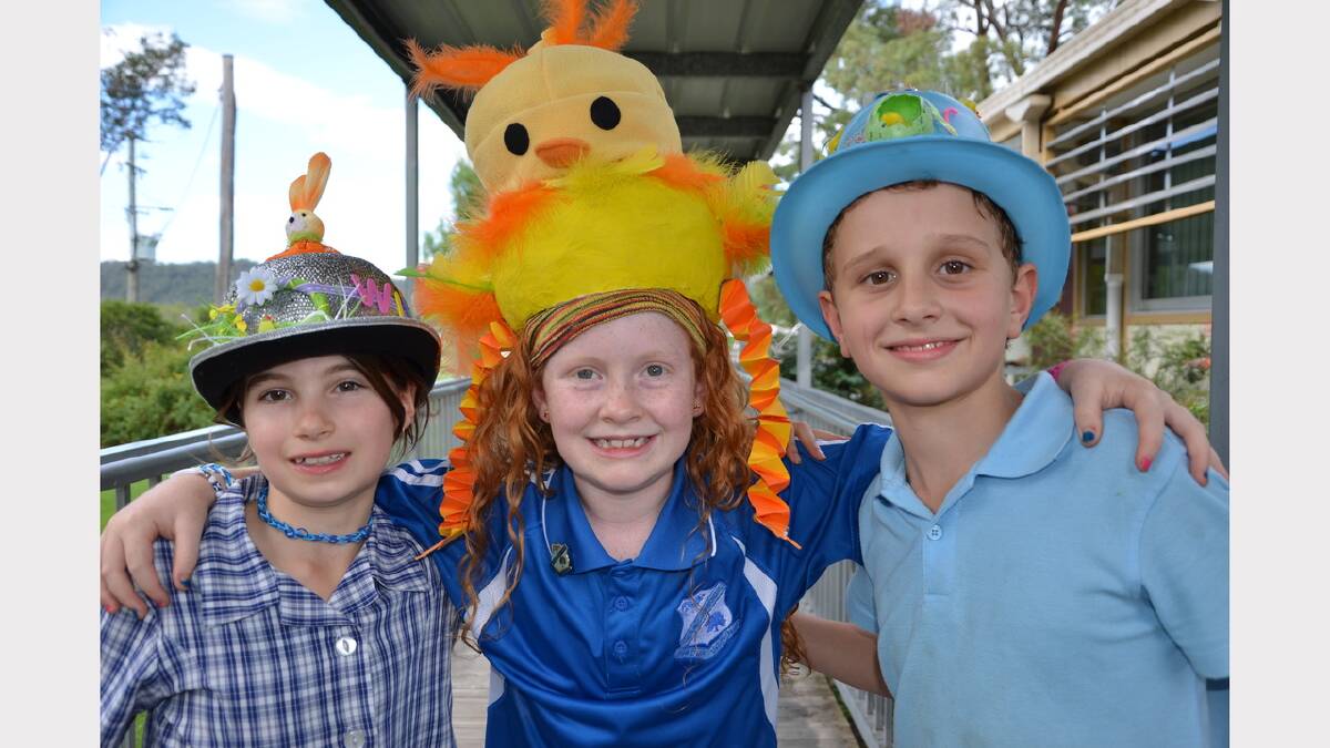 Elsie Horn, Charlie Boyton and Aaron Whelan having fun at the Easter hat parade at Glen William Public School on Friday.