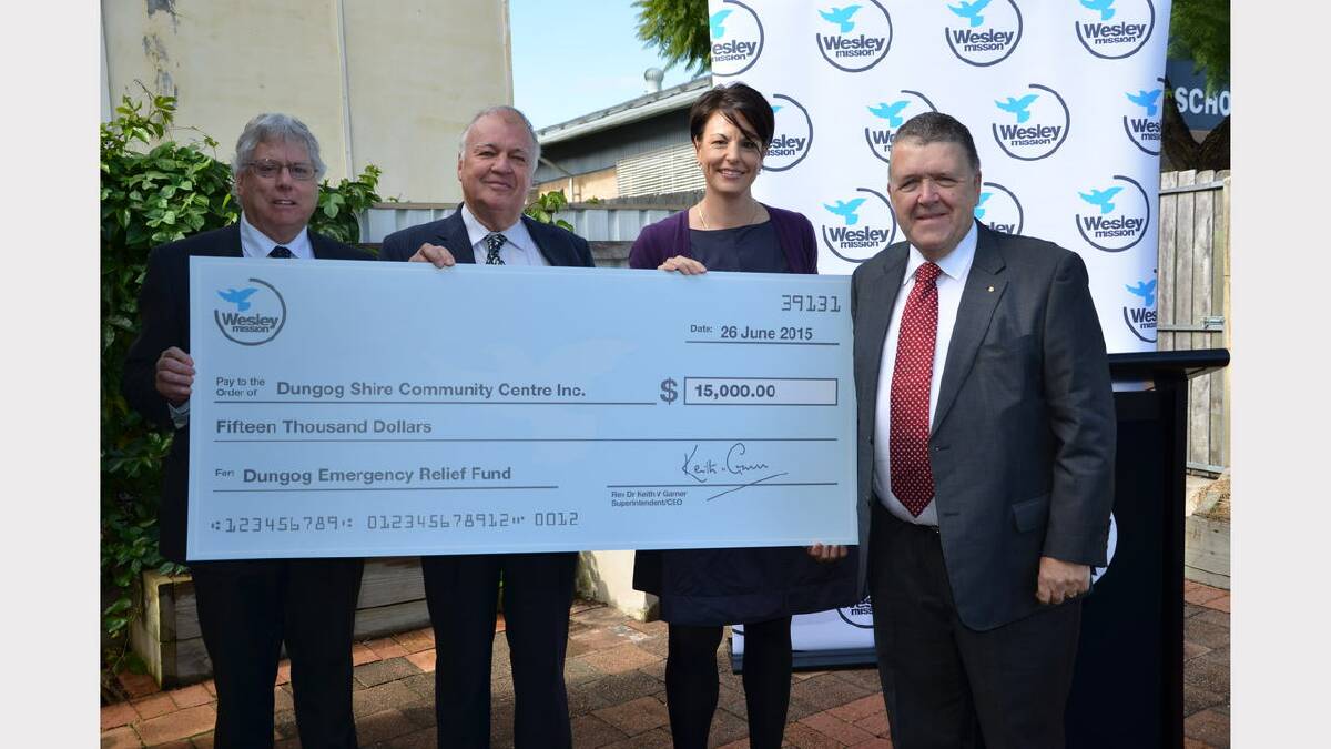 Wesley Mission's Peter O'Brien (left) and CEO Rev Dr Keith Garner (right) with Dungog mayor Cr Harold Johnston and manager of the Dungog Shire Community Centre Sarah U'Brien