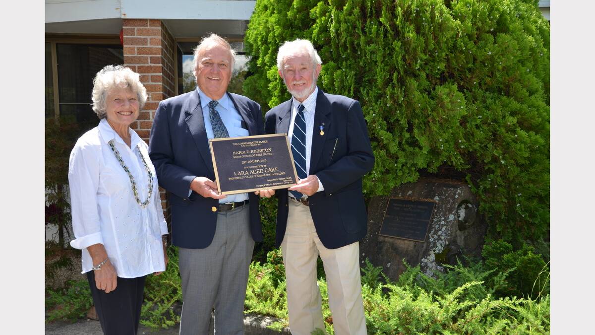 Lara Aged Care’s secretary Anne McDonald, mayor Harold Johnston and Lara chairman Ray Neilson with the new plaque to go on the rock which carries the original opening plaque.