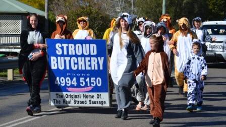 All the fun of the Stroud brick and rolling pin throwing competition parade down the main street to the showground