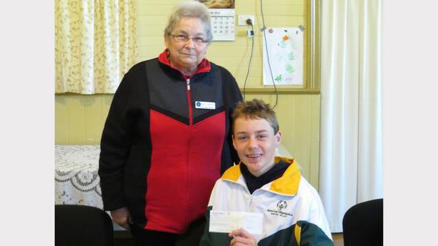 Dungog-Clarence Town CWA president Hazel Andrews with athlete Lleyton Lloyd