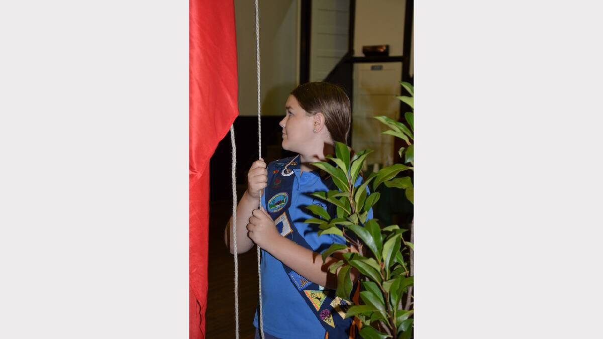 Aimee Turner raising the flag