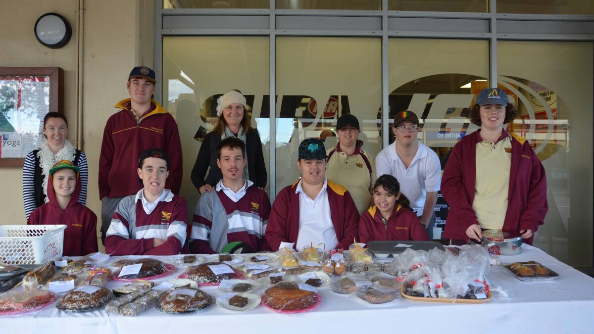 The Dungog High School special education unit held a cake stall at the end of last term. Pictured are, back, teacher Fleur Dives, Adam Moss, teachers’ aid Fran Rooke, Talee Andrews, Nathan Rumbel, Acelyn Towers-Brown; seated, Chloe Burns, Joel Fletcher, Bryce Lloyd, Nicholas Flynn and Jasmine Bates.