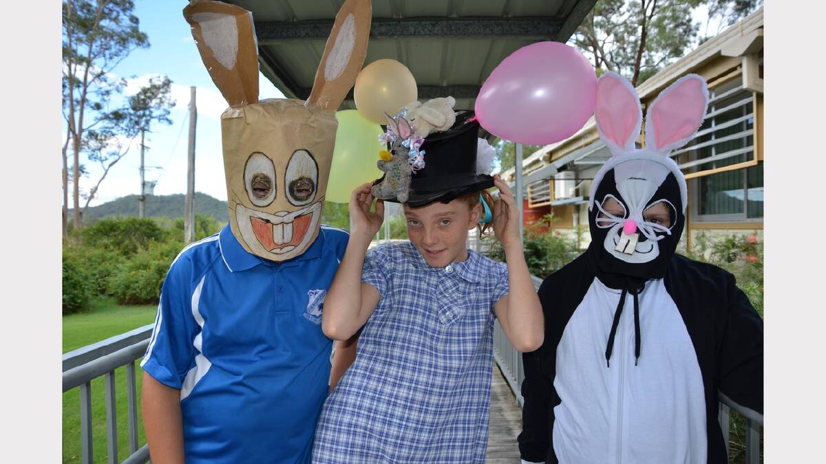  Matthew Tippett, Beth Flannery and Caiden Bagnall having fun at the Easter hat parade at Glen William Public School on Friday.