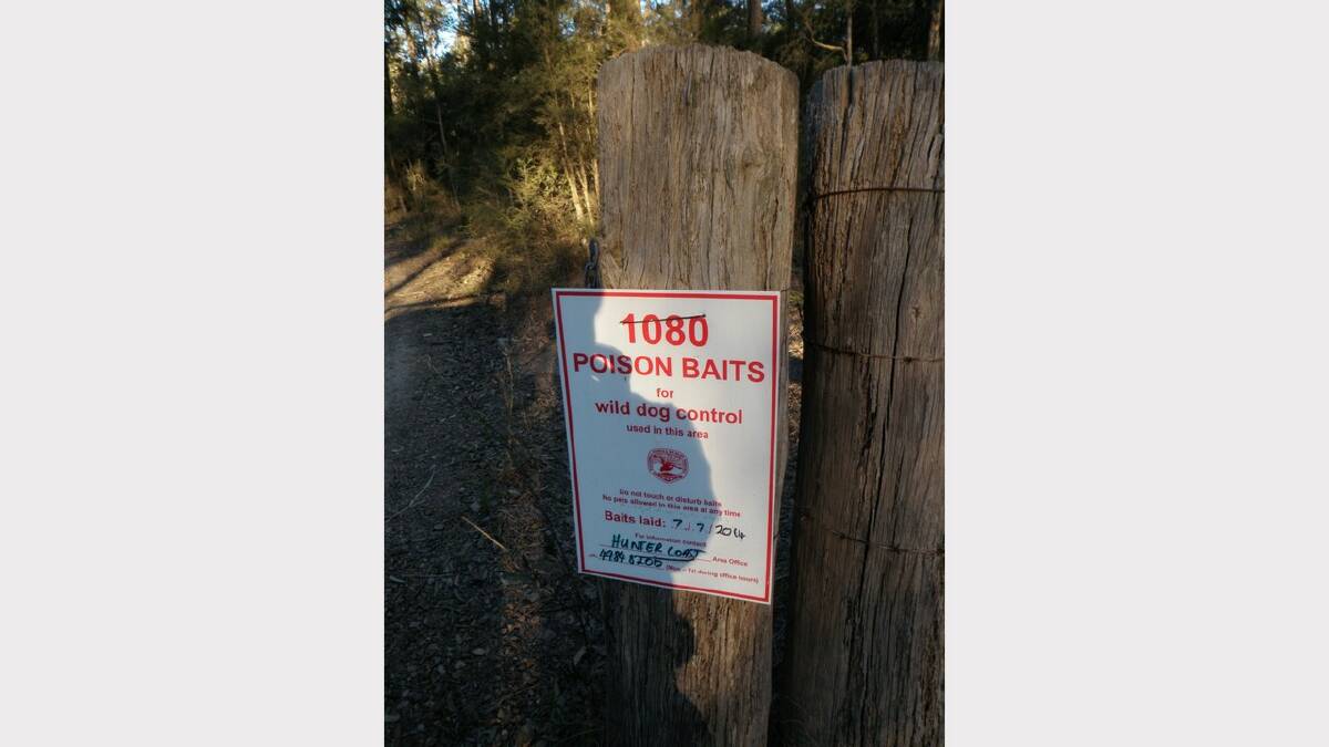 One of the signs in the national park at Clarence Town warning of dog baits