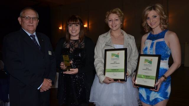 Bob Humphrey from the Rotary Club of Dungog, sponsor of the Outstanding Employee under 25 years award with winner Emily Baker and runners-up Laura Saunders and Tamara Lye.