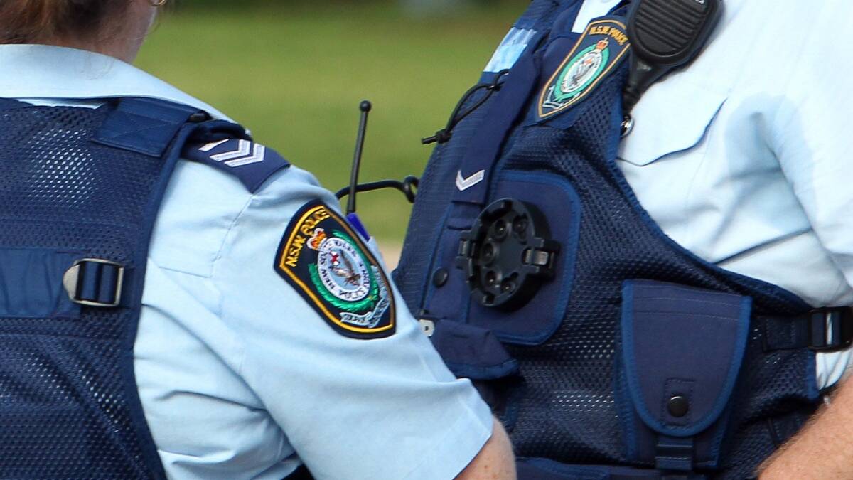 Dungog police saved a man clinging to a dingy in a dam on Monday afternoon