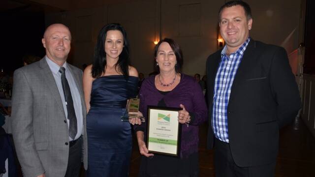 Sponsors of the Rural Producers, Manufacturing & Industry Award Peter Trappel and James Lovegrove from Lovey’s Supa IGA Plus Liquor with the winner Tara Skinner from T & R Steel and runner-up Robyn Burgmann from Paterson Service Station, Automotive Repairs and River Café.