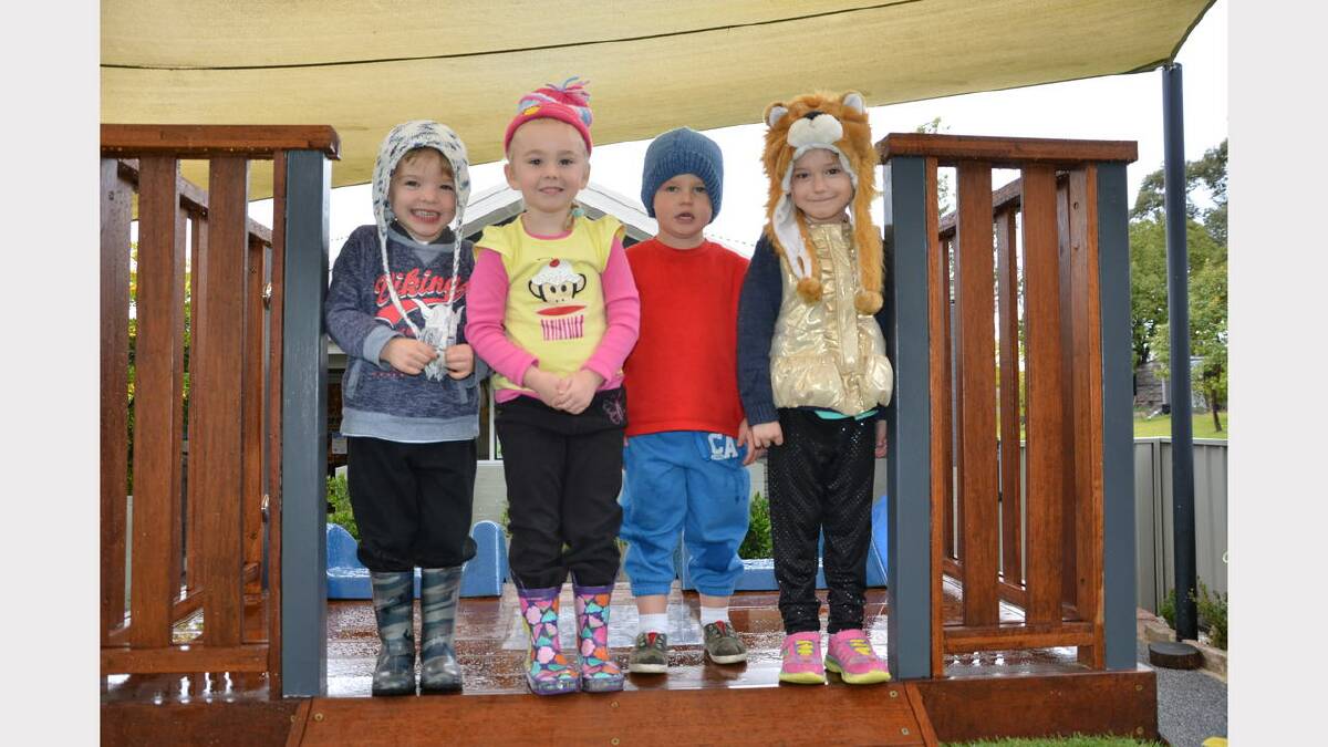 Thrilled with their new playground equipment are Jesse Chapman, Kyla Digby, Fletcher Barrett and Danielle Carroll.