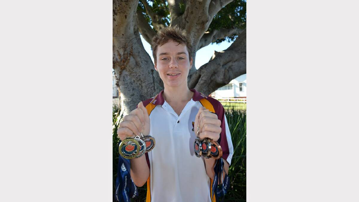 Lleyton Lloyd with his six medals from the NSW All Schools Track and Field Championships held last month