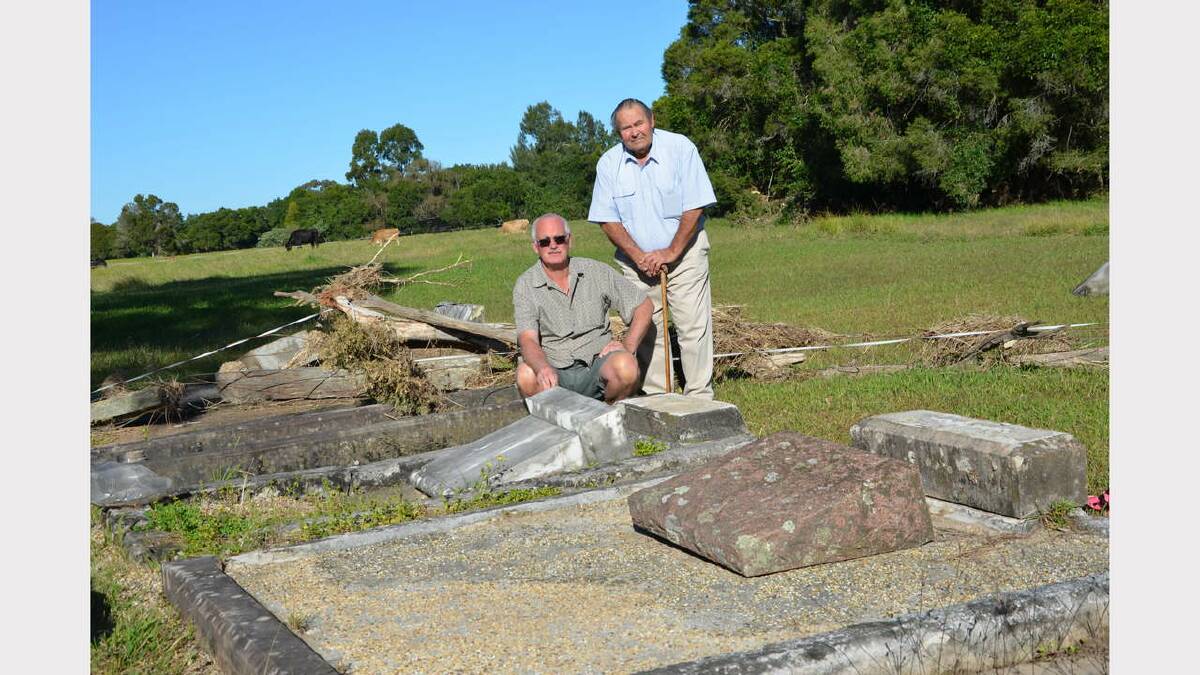 Eddie Rumbel and Trevor Eyb surveying the damage at Thalaba cemetery