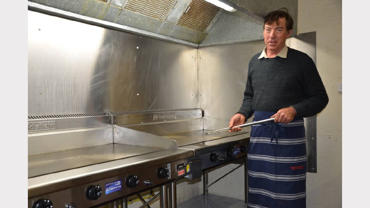 Peter Lawrence with the new barbecues recently installed at Gresford Showground.