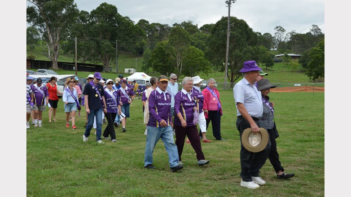Survivors and carers walk the first lap