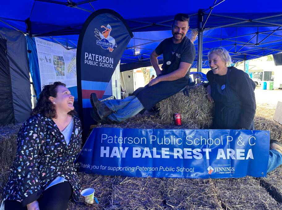 Paterson Public School P&C members Kate Meyn-Shrimpton, Darren Gill and Heidi Barker at the Tocal Field Days. The stall will be one of many at the agricultural campus over the next few days. Picture by Alanna Tomazin