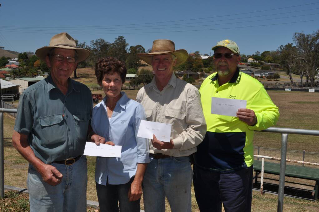 Dungog Rodeo secretary-treasurer Des Hopson with cheque recipients Jan Watkins (Westpac Rescue Helicopter Dungog Shire Support Group), Peter Dillon (Rotary Club of Dungog) and Dennis Collison (Dungog Rural Fire Service).  