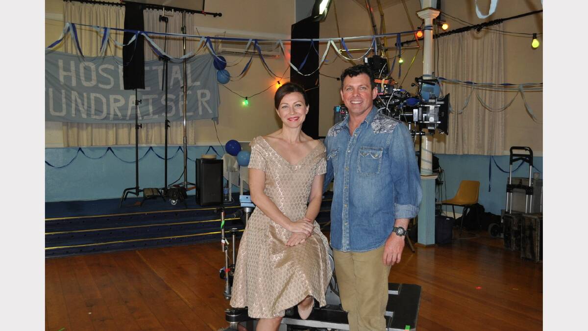 Director Warwick Young with actor Anita Hegh during the filming of the dance scene at the Anglican Church hall