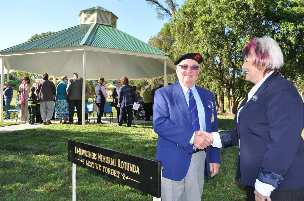 Stroud ex-serviceman John Bowen joins with Great Lakes Councillor Karen Hutchinson in opening the new rotunda during Anzac Day celebrations last week.