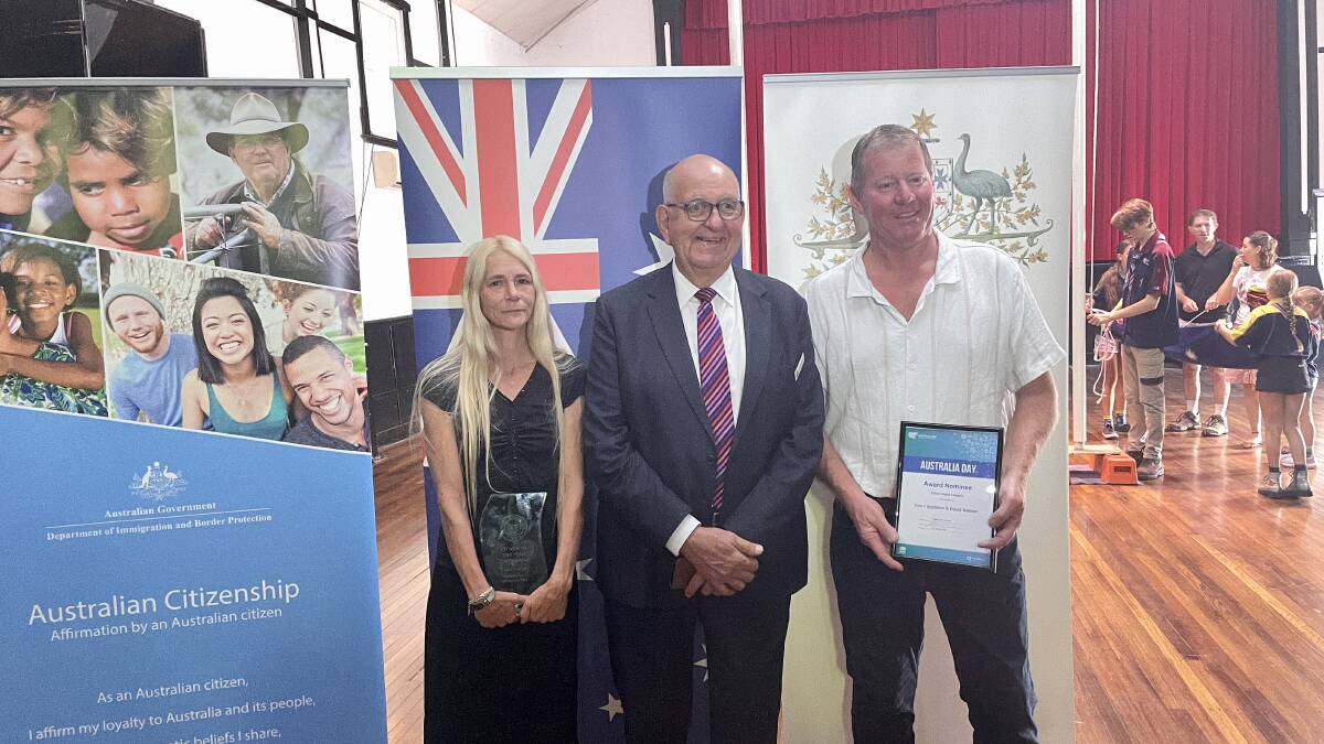 Erin Fitzgibbon and David Neilson receiving their award from Dungog's Mayor John Connors. picture by Angus Michie