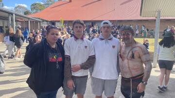 NAIDOC: Kara Clements (left) with Indigenous community leader Justin Ridgeway (right) and two Dungog High School students. Picture: Angus Michie