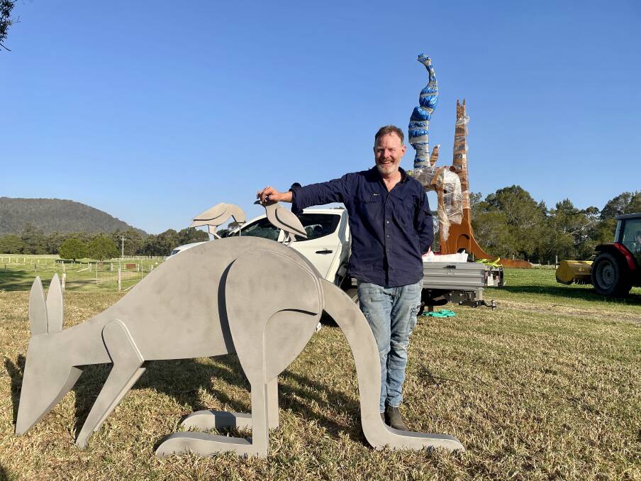 Sculptor Jimmy Rix pictured with one of his works he is installing for Sculpture on the Farm.