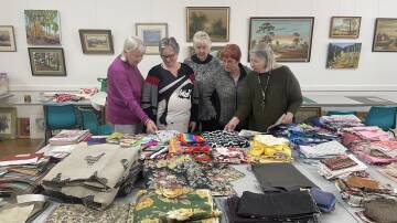 GOOD CAUSE: CWA members (from left) Wendy Hogan, Judith Skimmings, Lois Sanders, Judy Flannery and Julie Fitzgerald. Picture: Angus Michie