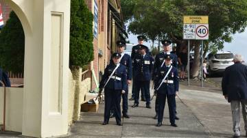 Representatives from the Williamtown RAAF base at Dungog's ANZAC Day ceremony. Picture by Angus Michie