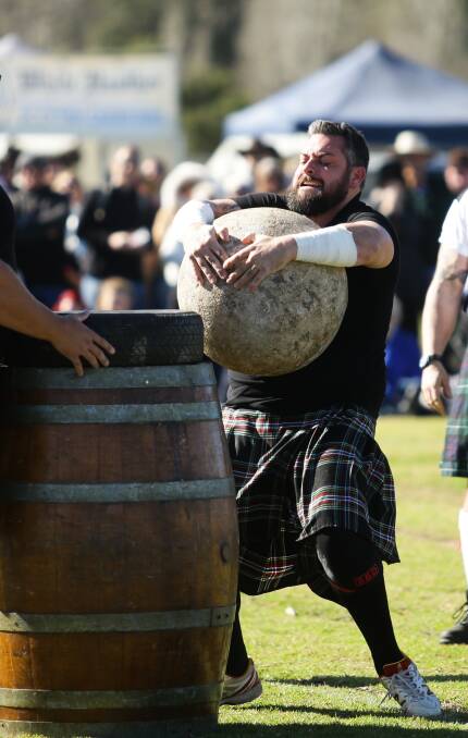 VERSATILE: Kurt competes in a variety of strongman contests, this one the Aberdeen Highland Games.