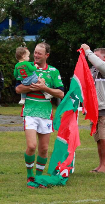 Milestone: Phil Badior, pictured with daughter Addison has become the third member to play 200 games for the club. Picture: Maureen Foot, FootPrints Creative Photography