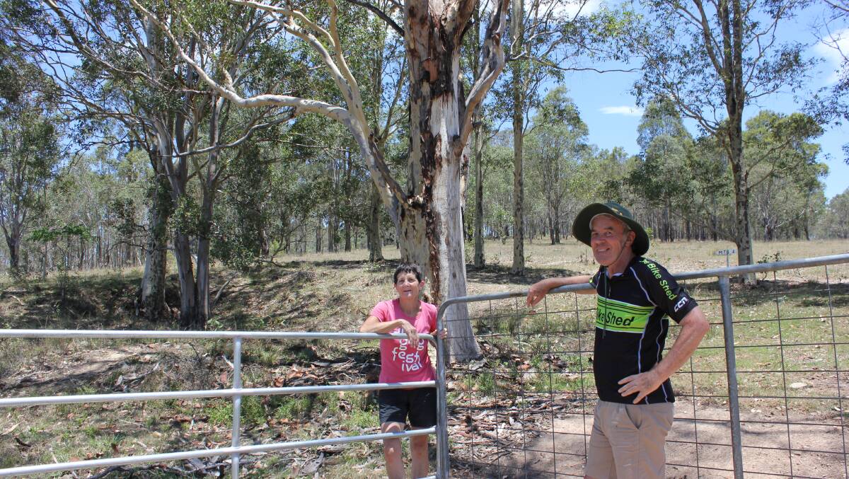 Ros Runciman and Allen Shrimpton from the Dungog Common Recreation Reserve Trust with the new gates. Photo: Michelle Mexon